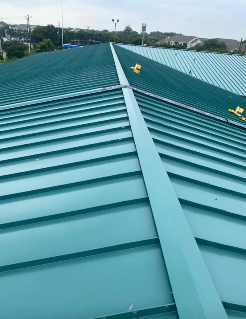 Green commercial metal roof ridge and valley for Metal Roof Repair in Allen